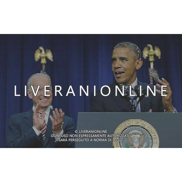 (140722)--WASHINGTON D.C., July 22, 2014 ()-- U.S. President Barack Obama (R) speaks before he signes the Workforce Innovation and Opportunity Act at White House in Washington D.C., capital of the United States, July 22, 2014. U.S. President Barack Obama singed H.R.803, the Workforce Innovation and Opportunity Act, which reauthorizes and reforms core workforce development programs administered by the Departments of Education and Labor and transfers from the Department of Education to the Department of Health and Human Services certain disability and independent living program functions, on Tuesday. (/Bao Dandan) ©PHOTOSHOT/AGENZIA ALDO LIVERANI SAS - ITALY ONLY - EDITORIAL USE ONLY