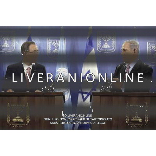 (140722) -- TEL AVIV, July 22, 2014 () -- Visiting UN Secretary-General Ban Ki-moon (L) and Israeli Prime Minister Benjamin Netanyahu attend a joint news conference in Tel Aviv, Israel, on July 22, 2014. As the UN Secretary-General Ban Ki-moon is in Israel to broker a peace between the Jewish state and the Islamist Hamas Movement, Israel army said it has no intention to cease its Gaza offensive before rooting out the \'terror tunnels\' that Hamas are using to sneak into Israel. (/JINI) ©PHOTOSHOT/AGENZIA ALDO LIVERANI SAS - ITALY ONLY - EDITORIAL USE ONLY