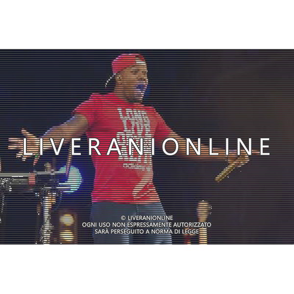 Rudimental perform on the Main Stage at T in the Park Festival, Balado, Scotland UK on 12th July 2014. Shown here DJ Locksmith ( Leon Rolle - red T-shirt) ©PHOTOSHOT/AGENZIA ALDO LIVERANI SAS - ITALY ONLY - EDITORIAL USE ONLY
