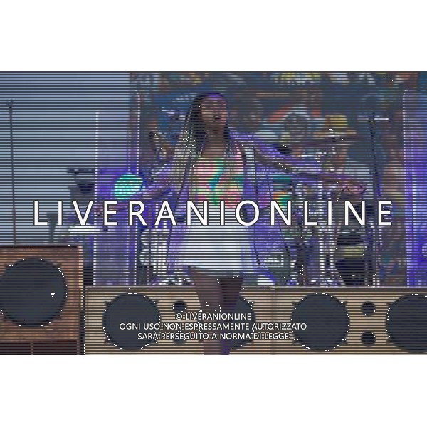 Rudimental perform on the Main Stage at T in the Park Festival, Balado, Scotland UK on 12th July 2014. Shown here Bridgette Amofah ©PHOTOSHOT/AGENZIA ALDO LIVERANI SAS - ITALY ONLY - EDITORIAL USE ONLY