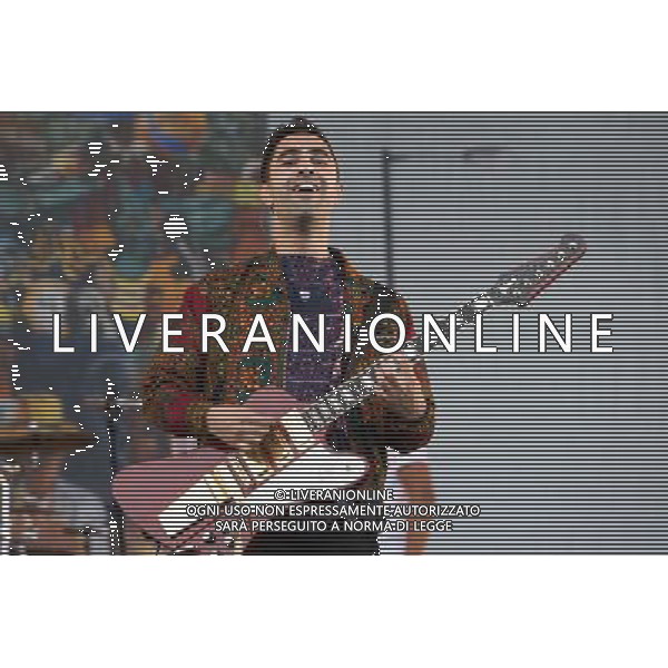 Rudimental perform on the Main Stage at T in the Park Festival, Balado, Scotland UK on 12th July 2014. Shown here Amir Amor (guitar) ©PHOTOSHOT/AGENZIA ALDO LIVERANI SAS - ITALY ONLY - EDITORIAL USE ONLY