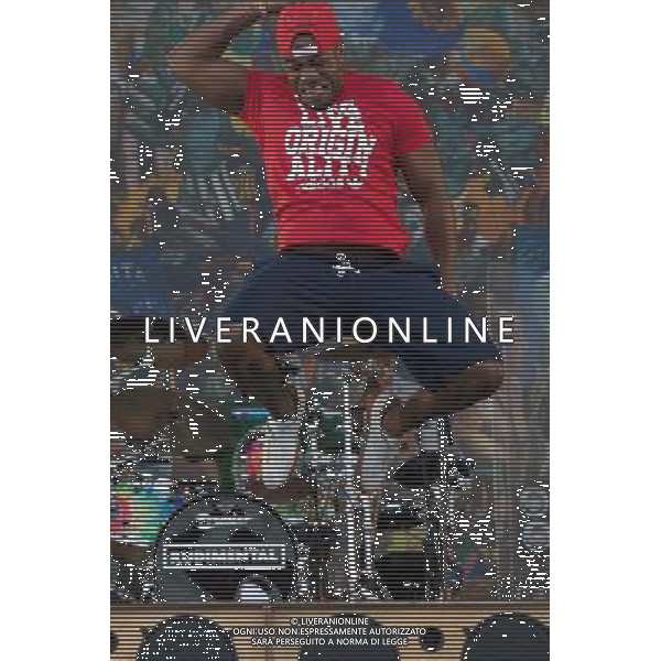 Rudimental perform on the Main Stage at T in the Park Festival, Balado, Scotland UK on 12th July 2014. Shown here DJ Locksmith ( Leon Rolle - red T-shirt) ©PHOTOSHOT/AGENZIA ALDO LIVERANI SAS - ITALY ONLY - EDITORIAL USE ONLY