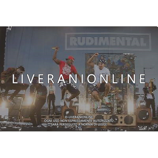 Rudimental perform on the Main Stage at T in the Park Festival, Balado, Scotland UK on 12th July 2014. Shown here DJ Locksmith ( Leon Rolle - red T-shirt), Amir Amor (left), Piers Agget, Mark Crown and Kesi Dryden ©PHOTOSHOT/AGENZIA ALDO LIVERANI SAS - ITALY ONLY - EDITORIAL USE ONLY