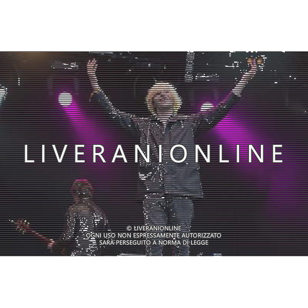 The Charlatans perform on the Radio 1 Stage T in the Park Festival, Balado, Scotland UK on 12th July 2014. The band consists of Tim Burgess (vocals), Mark Collins (guitar), Martin Blunt (bass guitar) ©PHOTOSHOT/AGENZIA ALDO LIVERANI SAS - ITALY ONLY - EDITORIAL USE ONLY