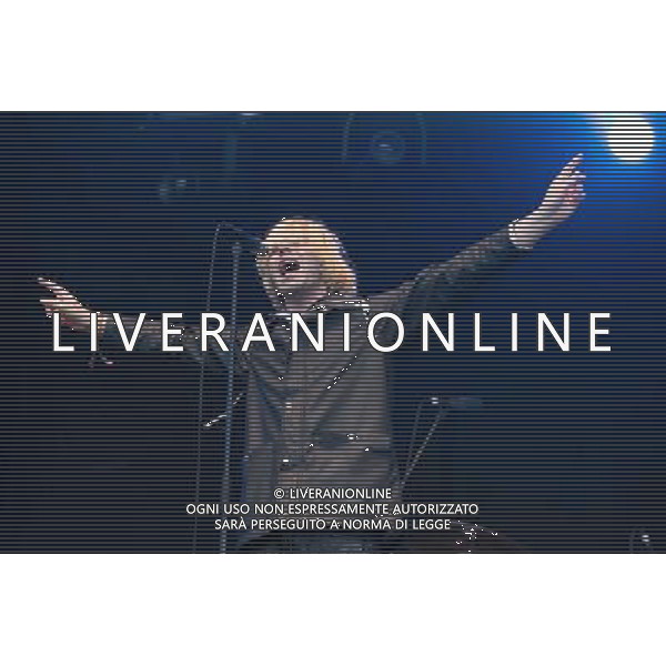 The Charlatans perform on the Radio 1 Stage T in the Park Festival, Balado, Scotland UK on 12th July 2014. The band consists of Tim Burgess (vocals), Mark Collins (guitar), Martin Blunt (bass guitar) ©PHOTOSHOT/AGENZIA ALDO LIVERANI SAS - ITALY ONLY - EDITORIAL USE ONLY