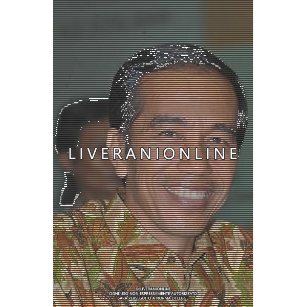 (140723) -- JAKARTA, July 23, 2014 (Xinhua) -- Indonesian presidential candidate Joko Widodo attends the election count announcement in Jakarta, Indonesia, July 22, 2014. Governor of Indonesia\'s capital city Jakarta Joko Widodo was qualified to become the nation\'s new president after the General Election Commission (KPU) settled the vote tally on Tuesday, showing Joko\'s domination against rival Prabowo Subianto. (Xinhua/Agung Kuncahya B.) ****Authorized b ytfs**** ©photoshot/AGENZIA ALDO LIVERANI SAS - ITALY ONLY - EDITORIAL USE ONLY
