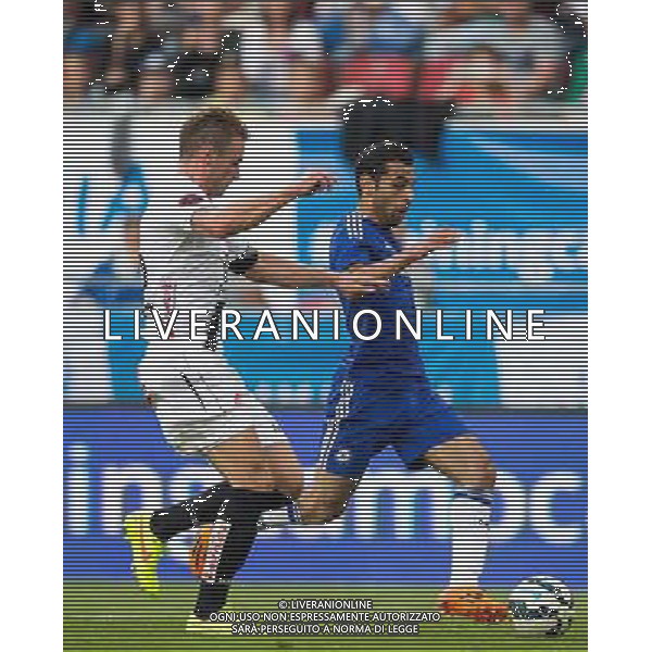 Michael Sollbauer (RZ Pellets WAC) gegen Mohamed Salah (FC Chelsea) // during a Friendly Match between RZ Pellets WAC and FC Chelsea at the Wˆrthersee Arena, Klagenfurt, Austria on 2014/07/23. EXPA Pictures © 2014, PhotoCredit: EXPA/ Johann Groder ©photoshot/AGENZIA ALDO LIVERANI SAS - ITALY ONLY - EDITORIAL USE ONLY