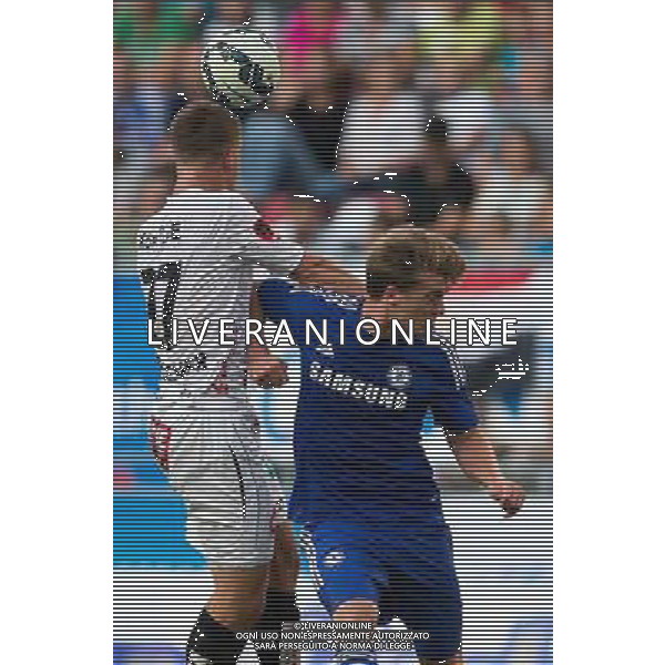 Kopfball Daniel Drescher (RZ Pellets WAC) gegen Patrick Bamford (FC Chelsea) // during a Friendly Match between RZ Pellets WAC and FC Chelsea at the Wˆrthersee Arena, Klagenfurt, Austria on 2014/07/23. EXPA Pictures © 2014, PhotoCredit: EXPA/ Johann Groder ©photoshot/AGENZIA ALDO LIVERANI SAS - ITALY ONLY - EDITORIAL USE ONLY