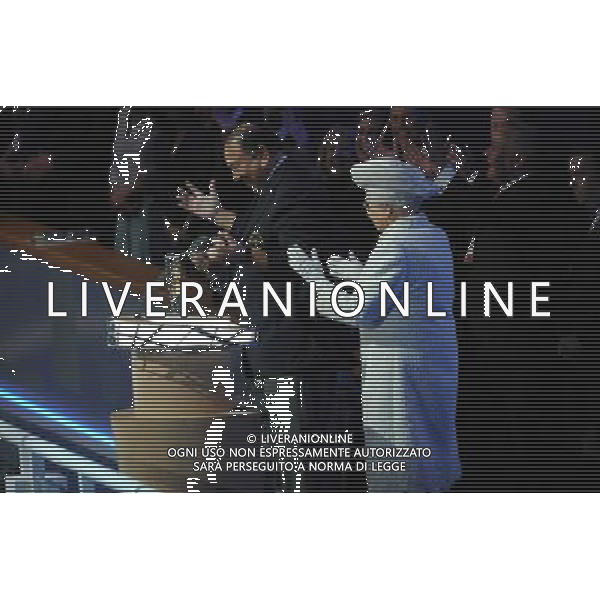 SIR CHRIS HOY HELPS HRH PRINCE IMRAN WITH BATON IN FRONT OF HER MAJESTY THE QUEEN COMMONWEALTH GAMES 2014, GLASGOW COMMONWEALTH GAMES 2014 CELTIC PARK, GLASGOW, SCOTLAND 23 July 2014 DIC9606 ©photoshot/AGENZIA ALDO LIVERANI SAS - ITALY ONLY - EDITORIAL USE ONLY