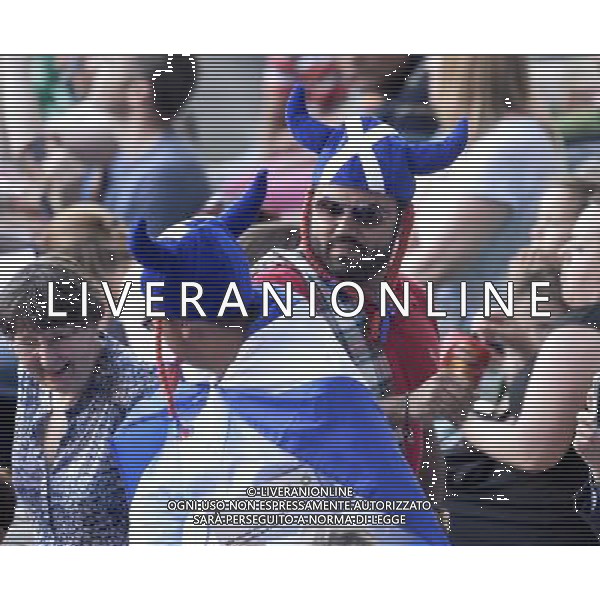 Sports fans arrive and are dressed for the opening ceremony for the Glasgow Commonwealth games. Commonwealth Games Opening Ceremony general public dressing up, Celtic Park, Glasgow, 23.07.14 ©photoshot/AGENZIA ALDO LIVERANI SAS - ITALY ONLY - EDITORIAL USE ONLY