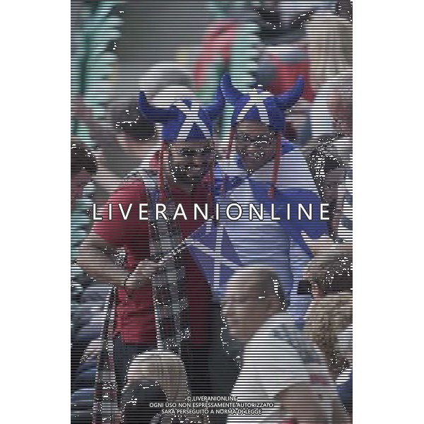 Sports fans arrive and are dressed for the opening ceremony for the Glasgow Commonwealth games. Commonwealth Games Opening Ceremony general public dressing up, Celtic Park, Glasgow, 23.07.14 ©photoshot/AGENZIA ALDO LIVERANI SAS - ITALY ONLY - EDITORIAL USE ONLY