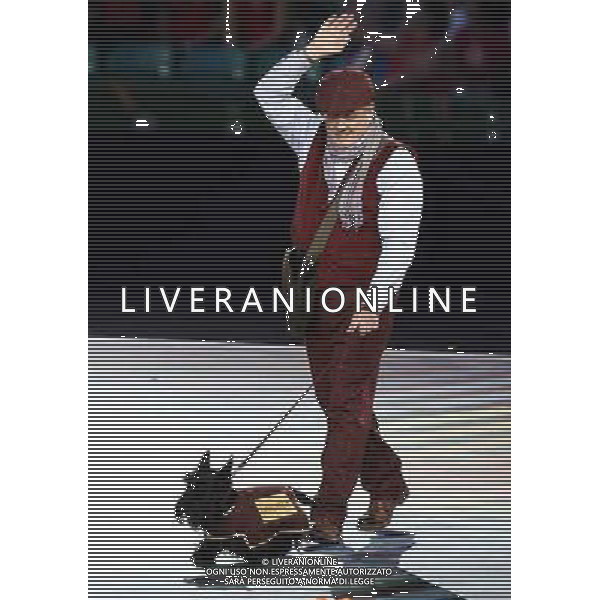 (140724) -- GLASGOW, July 24, 2014() -- A Scottish Terrier walks with his handler as a team name bearer during the opening ceremony of the XX Commonwealth Games at the Celtic Park in Glasgow July 23, 2014. (/Wang Lili) ©photoshot/AGENZIA ALDO LIVERANI SAS - ITALY ONLY - EDITORIAL USE ONLY