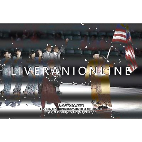 (140724) -- GLASGOW, July 24, 2014 () -- Members of the Malaysian delegation attend the opening ceremony of the XX Commonwealth Games at the Celtic Park in Glasgow, Britain, July 23, 2014. (/Wang Lili) ©photoshot/AGENZIA ALDO LIVERANI SAS - ITALY ONLY - EDITORIAL USE ONLY
