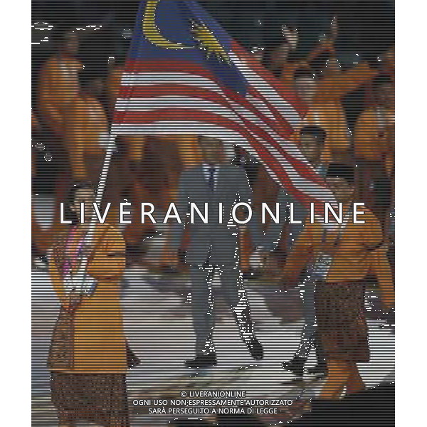 (140724) -- GLASGOW, July 24, 2014 () -- Members of the Malaysian delegation attend the opening ceremony of the XX Commonwealth Games at the Celtic Park in Glasgow, Britain, July 23, 2014. (/Wang Lili) ©photoshot/AGENZIA ALDO LIVERANI SAS - ITALY ONLY - EDITORIAL USE ONLY