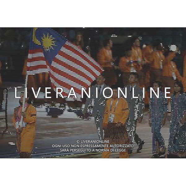 (140724) -- GLASGOW, July 24, 2014 () -- Members of the Malaysian delegation attend the opening ceremony of the XX Commonwealth Games at the Celtic Park in Glasgow, Britain, July 23, 2014. (/Wang Lili) ©photoshot/AGENZIA ALDO LIVERANI SAS - ITALY ONLY - EDITORIAL USE ONLY