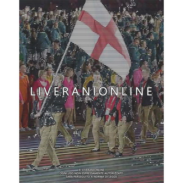 (140724) -- GLASGOW, July 24, 2014 () -- England\'s flagbearer Nick Matthew (1st L) leads the delegation during the opening ceremony for the XX Commonwealth Games at the Celtic Park in Glasgow, Britain, on July 23, 2014. (/Wang Lili) ©photoshot/AGENZIA ALDO LIVERANI SAS - ITALY ONLY - EDITORIAL USE ONLY