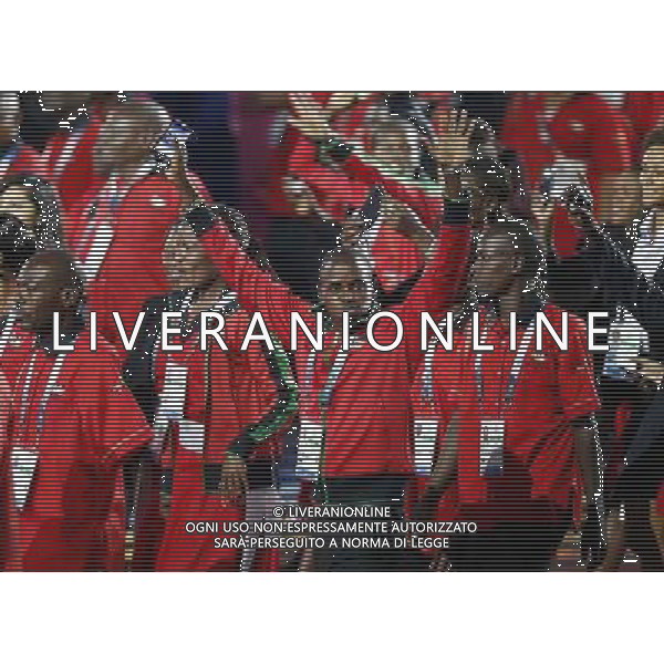 (140724) -- GLASGOW, July 24, 2014 () -- Members of Kenya\'s delegation wave as they march in during the Opening Ceremony for the XX Commonwealth Games at the Celtic Park in Glasgow, Britain, on July 23, 2014. (/Wang Lili) ©photoshot/AGENZIA ALDO LIVERANI SAS - ITALY ONLY - EDITORIAL USE ONLY