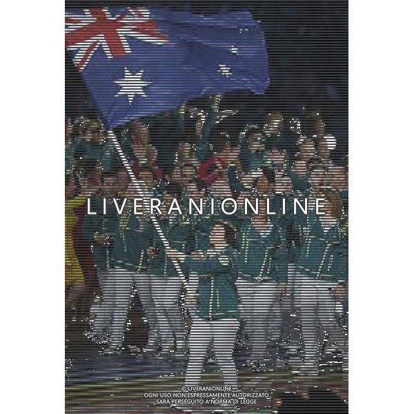 (140724) -- GLASGOW, July 24, 2014 () -- Flag bearer and Cyclist Anna Meares of Australia leads the delegation during the Opening Ceremony for the XX Commonwealth Games at the Celtic Park in Glasgow, Britain, on July 23, 2014. (/Wang Lili) ©photoshot/AGENZIA ALDO LIVERANI SAS - ITALY ONLY - EDITORIAL USE ONLY