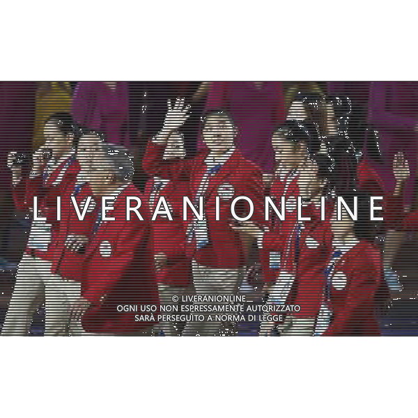 (140724) -- GLASGOW, July 24, 2014 () -- The delegation of Singapore march in during the Opening Ceremony for the XX Commonwealth Games at the Celtic Park in Glasgow, Britain, on July 23, 2014. (/Wang Lili) ©photoshot/AGENZIA ALDO LIVERANI SAS - ITALY ONLY - EDITORIAL USE ONLY
