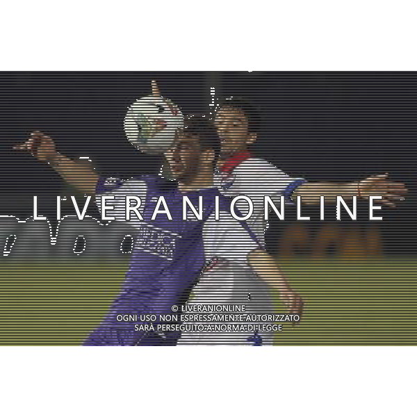 (140723) -- ASUNCION, July 23, 2014 () -- Julian Benitez (BACK) of Paraguay\'s Nacional vies for the ball with Enrique Echeverri of Uruguay\'s Defensor Sporting during the first leg of Libertadores Cup semifinals in Asuncion, Paraguay, on July 22, 2014. (/Marcelo Espinosa) (rh) (rt) ©photoshot/AGENZIA ALDO LIVERANI SAS - ITALY ONLY - EDITORIAL USE ONLY