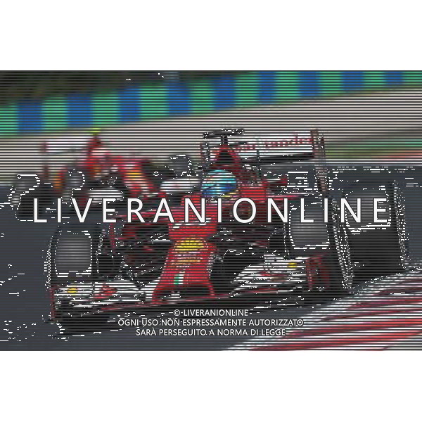 Fernando Alonso (ESP) Ferrari F14-T leads team mate Kimi Raikkonen (FIN) Ferrari F14-T. 25.07.2014. Formula 1 World Championship, Rd 11, Hungarian Grand Prix, Budapest, Hungary, Practice Day. - www.xpbimages.com, EMail: requests@xpbimages.com - copy of publication required for printed pictures. Every used picture is fee-liable. © Copyright: Moy / XPB Images AG ALDO LIVERANI SAS ONLY ITALY