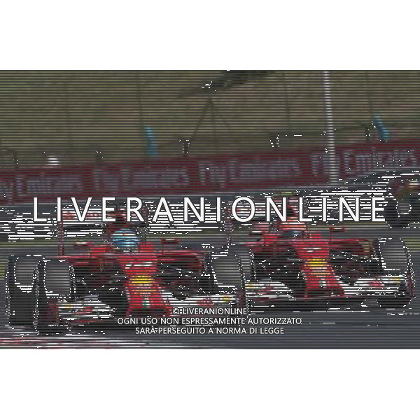 Fernando Alonso (ESP) Ferrari F14-T leads team mate Kimi Raikkonen (FIN) Ferrari F14-T. 25.07.2014. Formula 1 World Championship, Rd 11, Hungarian Grand Prix, Budapest, Hungary, Practice Day. - www.xpbimages.com, EMail: requests@xpbimages.com - copy of publication required for printed pictures. Every used picture is fee-liable. © Copyright: Photo4 / XPB Images AG ALDO LIVERANI SAS ONLY ITALY