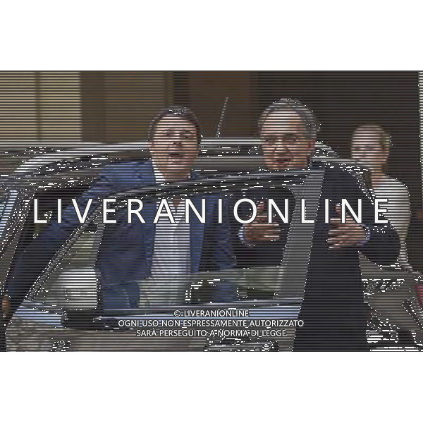 Roma - 25/07/2014 - Palazzo Chigi - Il presidente del Consiglio dei ministri Matteo Renzi incontra il Presidente della FIAT S.p.A John Elkann e lÕAmministratore Delegato Sergio Marchionne in occasione della presentazione della nuova autovettura ÒJeep RenegadeÓ - nella foto: Matteo Renzi e Sergio Marchionne / Ph. Fabrizio Corradetti - ag. Aldo Liverani Sas