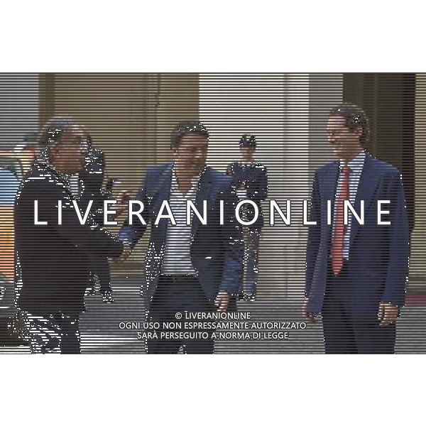 Roma - 25/07/2014 - Palazzo Chigi - Il presidente del Consiglio dei ministri Matteo Renzi incontra il Presidente della FIAT S.p.A John Elkann e lÕAmministratore Delegato Sergio Marchionne in occasione della presentazione della nuova autovettura ÒJeep RenegadeÓ - nella foto: Matteo Renzi Sergio Marchionne e John Elkann / Ph. Fabrizio Corradetti - ag. Aldo Liverani Sas