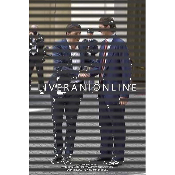 Roma - 25/07/2014 - Palazzo Chigi - Il presidente del Consiglio dei ministri Matteo Renzi incontra il Presidente della FIAT S.p.A John Elkann e lÕAmministratore Delegato Sergio Marchionne in occasione della presentazione della nuova autovettura ÒJeep RenegadeÓ - nella foto: Matteo Renzi e John Elkann / Ph. Fabrizio Corradetti - ag. Aldo Liverani Sas