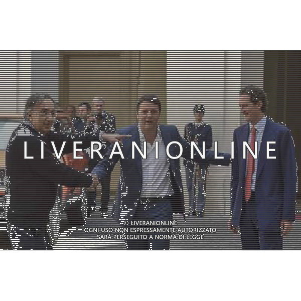 Roma - 25/07/2014 - Palazzo Chigi - Il presidente del Consiglio dei ministri Matteo Renzi incontra il Presidente della FIAT S.p.A John Elkann e lÕAmministratore Delegato Sergio Marchionne in occasione della presentazione della nuova autovettura ÒJeep RenegadeÓ - nella foto: Matteo Renzi Sergio Marchionne e John Elkann / Ph. Fabrizio Corradetti - ag. Aldo Liverani Sas