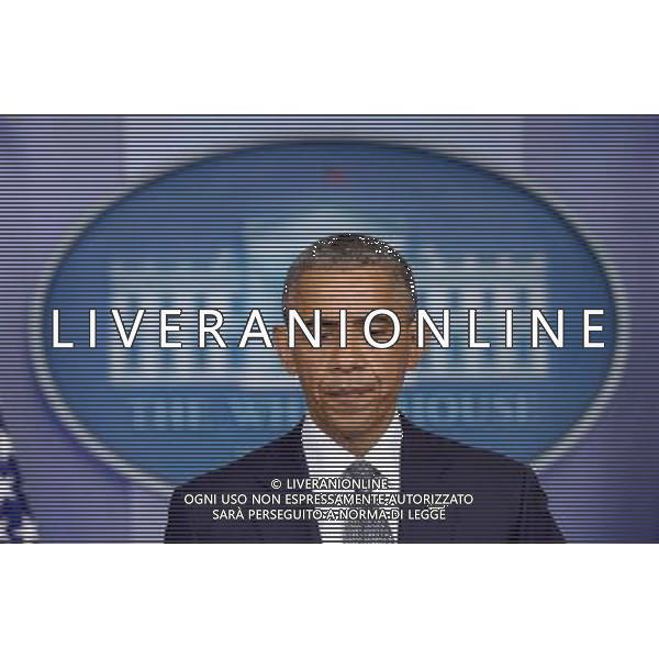 (140718) -- WASHINGTON D.C., July 18, 2014 () -- U.S. President Barack Obama speaks on the situation in Ukraine at the briefing room of the White House in Washington D.C., the United States, on July 18, 2014. Evidence showed that the missile that took down a Malaysian airliner was launched from an area that is controlled by separatists in eastern Ukraine, U.S. President Barack Obama said on Friday. (/Yin Bogu) ©PHOTOSHOT/AGENZIA ALDO LIVERANI SAS - ITALY ONLY - EDITORIAL USE ONLY