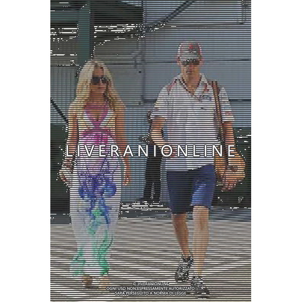 Adrian Sutil (GER) Sauber with his girlfriend Jennifer Becks (GER). 26.07.2014. Formula 1 World Championship, Rd 11, Hungarian Grand Prix, Budapest, Hungary, Qualifying Day. - www.xpbimages.com, EMail: requests@xpbimages.com - copy of publication required for printed pictures. Every used picture is fee-liable. © Copyright: Moy / XPB Images /AGENZIA ALDO LIVERANI SAS - ITALY ONLY - EDITORIAL USE ONLY - Gp F1 Ungheria Prove ufficiali
