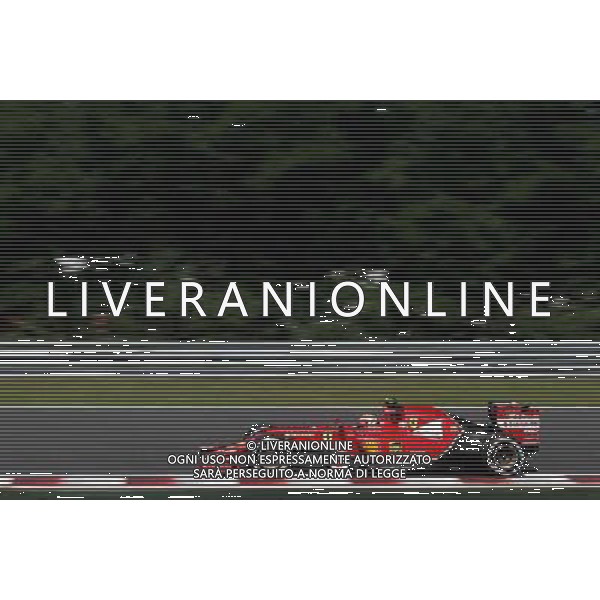 Kimi Raikkonen (FIN), Scuderia Ferrari 26.07.2014. Formula 1 World Championship, Rd 11, Hungarian Grand Prix, Budapest, Hungary, Qualifying Day. - www.xpbimages.com, EMail: requests@xpbimages.com - copy of publication required for printed pictures. Every used picture is fee-liable. © Copyright: Charniaux / XPB Images /AGENZIA ALDO LIVERANI SAS - ITALY ONLY - EDITORIAL USE ONLY - Gp F1 Ungheria Prove ufficiali