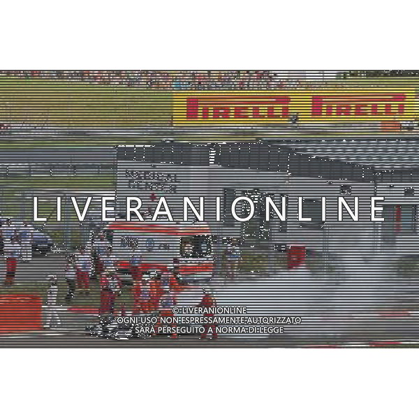 Lewis Hamilton (GBR) Mercedes AMG F1 W05 stops in the pitlane during qualifying after suffering a fire. 26.07.2014. Formula 1 World Championship, Rd 11, Hungarian Grand Prix, Budapest, Hungary, Qualifying Day. - www.xpbimages.com, EMail: requests@xpbimages.com - copy of publication required for printed pictures. Every used picture is fee-liable. © Copyright: Moy / XPB Images /AGENZIA ALDO LIVERANI SAS - ITALY ONLY - EDITORIAL USE ONLY - Gp F1 Ungheria Prove ufficiali