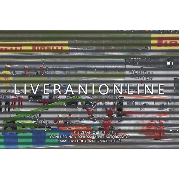 The Mercedes AMG F1 W05 is recovered back to the pits having caught fire during qualifying. 26.07.2014. Formula 1 World Championship, Rd 11, Hungarian Grand Prix, Budapest, Hungary, Qualifying Day. - www.xpbimages.com, EMail: requests@xpbimages.com - copy of publication required for printed pictures. Every used picture is fee-liable. © Copyright: Moy / XPB Images /AGENZIA ALDO LIVERANI SAS - ITALY ONLY - EDITORIAL USE ONLY - Gp F1 Ungheria Prove ufficiali