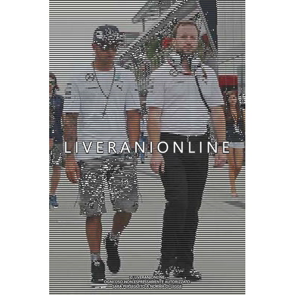 Lewis Hamilton (GBR) Mercedes AMG F1 with Bradley Lord (GBR) Mercedes AMG F1 Communications Manager. 26.07.2014. Formula 1 World Championship, Rd 11, Hungarian Grand Prix, Budapest, Hungary, Qualifying Day. - www.xpbimages.com, EMail: requests@xpbimages.com - copy of publication required for printed pictures. Every used picture is fee-liable. © Copyright: Photo4 / XPB Images /AGENZIA ALDO LIVERANI SAS - ITALY ONLY - EDITORIAL USE ONLY - Gp F1 Ungheria Prove ufficiali