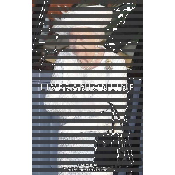 Queen Elizabeth II arrives at the opening ceremony of the Glasgow 2014 Commonwealth Games at Celtic Park in Glasgow, Scotland. A party atmosphere has descended on Celtic Park where the audience of 40,000 people enjoy the opening ceremony of the 20th Commonwealth Games. ©PHOTOSHOT/AGENZIA ALDO LIVERANI SAS - ITALY ONLY - EDITORIAL USE ONLY ©photoshot/AGENZIA ALDO LIVERANI SAS - ITALY ONLY - EDITORIAL USE ONLY - REALI INGLESI