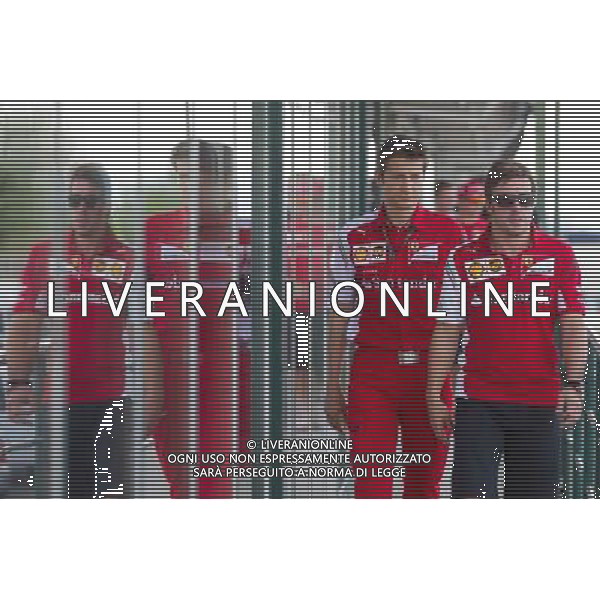 (140726) -- MOGYOROD, July 26, 2014 () -- Ferrari driver Fernando Alonso (R) of Spain walks to a drivers\' briefing during the F1 Hungarian Grand Prix at Hungaroring in Mogyorod, Hungary on July 25, 2014. Lewis Hamilton set the fastest time with 1 minute 25.814 seconds in the first free practice session. He also set the fastest time with 1 minute 24.482 seconds in the second free practice session. (/Attila Volgyi) ©photoshot/AGENZIA ALDO LIVERANI SAS - ITALY ONLY - EDITORIAL USE ONLY