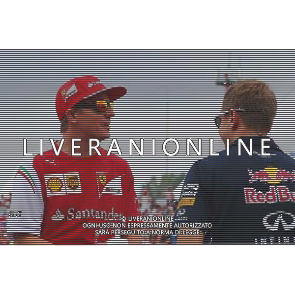 (L to R): Kimi Raikkonen (FIN) Ferrari and Sebastian Vettel (GER) Red Bull Racing on the drivers parade. 27.07.2014. Formula 1 World Championship, Rd 11, Hungarian Grand Prix, Budapest, Hungary, Race Day. - www.xpbimages.com, EMail: requests@xpbimages.com - copy of publication required for printed pictures. Every used picture is fee-liable. © Copyright: Batchelor / XPB Images AG ALDO LIVERANI SAS ONLY ITALY