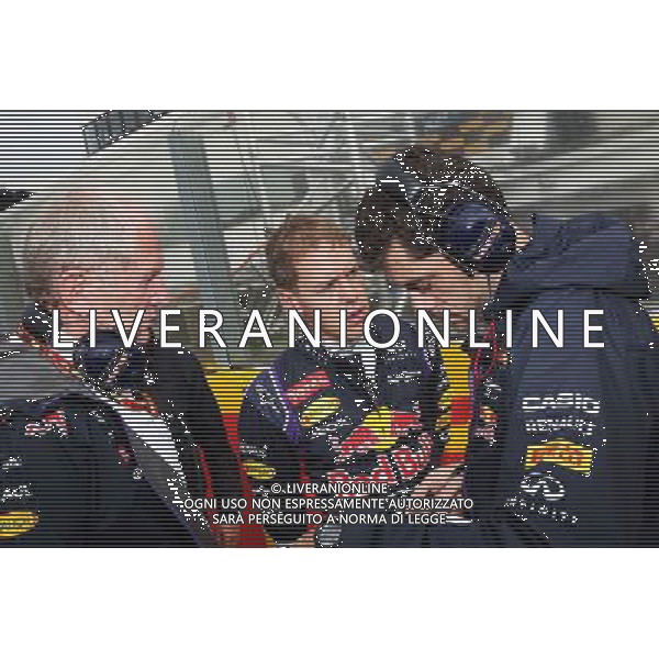 (L to R): Dr Helmut Marko (AUT) Red Bull Motorsport Consultant with Sebastian Vettel (GER) Red Bull Racing and Guillaume Rocquelin (ITA) Red Bull Racing Race Engineer on the grid. 27.07.2014. Formula 1 World Championship, Rd 11, Hungarian Grand Prix, Budapest, Hungary, Race Day. - www.xpbimages.com, EMail: requests@xpbimages.com - copy of publication required for printed pictures. Every used picture is fee-liable. © Copyright: Photo4 / XPB Images ag aldo liverani sas only italy