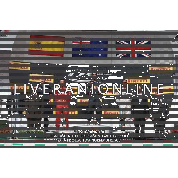 1st place Daniel Ricciardo (AUS) Red Bull Racing RB10, 2nd place Fernando Alonso (ESP) Ferrari and 3rd place Lewis Hamilton (GBR) Mercedes AMG F1. 27.07.2014. Formula 1 World Championship, Rd 11, Hungarian Grand Prix, Budapest, Hungary, Race Day. - www.xpbimages.com, EMail: requests@xpbimages.com - copy of publication required for printed pictures. Every used picture is fee-liable. © Copyright: Batchelor / XPB Images AG ALDO LIVERANI SAS ONLY ITALY