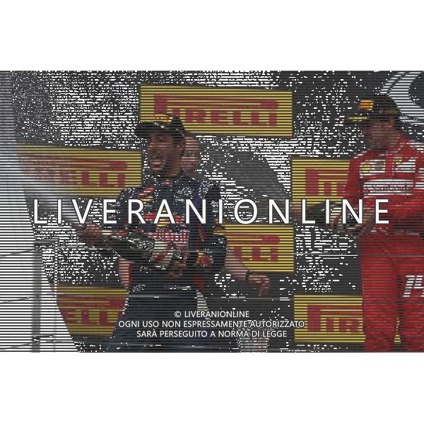 1st place Daniel Ricciardo (AUS) Red Bull Racing RB10 and 2nd place Fernando Alonso (ESP) Ferrari. 27.07.2014. Formula 1 World Championship, Rd 11, Hungarian Grand Prix, Budapest, Hungary, Race Day. - www.xpbimages.com, EMail: requests@xpbimages.com - copy of publication required for printed pictures. Every used picture is fee-liable. © Copyright: Batchelor / XPB Images AG ALDO LIVERANI SAS ONLY ITALY