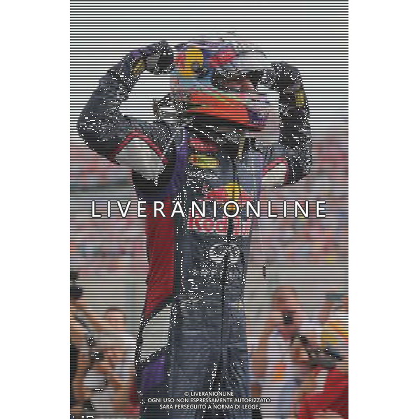 Race winner Daniel Ricciardo (AUS) Red Bull Racing celebrates in parc ferme. 27.07.2014. Formula 1 World Championship, Rd 11, Hungarian Grand Prix, Budapest, Hungary, Race Day. - www.xpbimages.com, EMail: requests@xpbimages.com - copy of publication required for printed pictures. Every used picture is fee-liable. © Copyright: Moy / XPB Images AG ALDO LIVERANI SAS ONLY ITALY