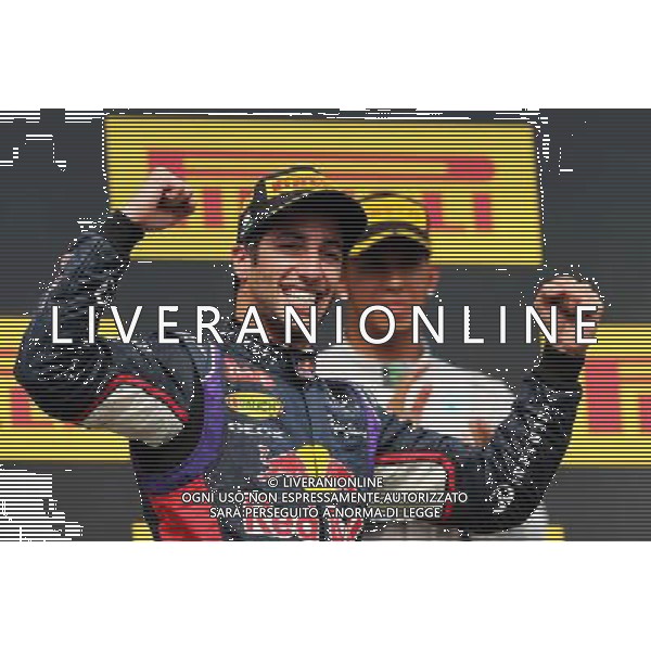 Race winner Daniel Ricciardo (AUS) Red Bull Racing celebrates on the podium. 27.07.2014. Formula 1 World Championship, Rd 11, Hungarian Grand Prix, Budapest, Hungary, Race Day. - www.xpbimages.com, EMail: requests@xpbimages.com - copy of publication required for printed pictures. Every used picture is fee-liable. © Copyright: Moy / XPB Images AG ALDO LIVERANI SAS ONLY ITALY