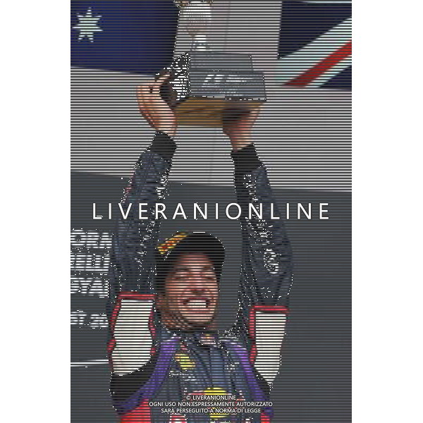 Race winner Daniel Ricciardo (AUS) Red Bull Racing celebrates on the podium. 27.07.2014. Formula 1 World Championship, Rd 11, Hungarian Grand Prix, Budapest, Hungary, Race Day. - www.xpbimages.com, EMail: requests@xpbimages.com - copy of publication required for printed pictures. Every used picture is fee-liable. © Copyright: Moy / XPB Images AG ALDO LIVERANI SAS ONLY ITALY