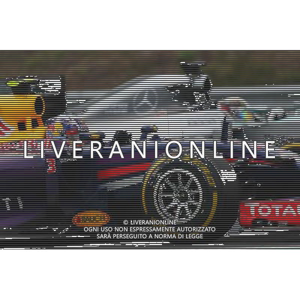 Daniel Ricciardo (AUS) Red Bull Racing RB10 and Lewis Hamilton (GBR) Mercedes AMG F1 W05. 27.07.2014. Formula 1 World Championship, Rd 11, Hungarian Grand Prix, Budapest, Hungary, Race Day. - www.xpbimages.com, EMail: requests@xpbimages.com - copy of publication required for printed pictures. Every used picture is fee-liable. © Copyright: Batchelor / XPB Images AG ALDO LIVERANI SAS ONLY ITALY