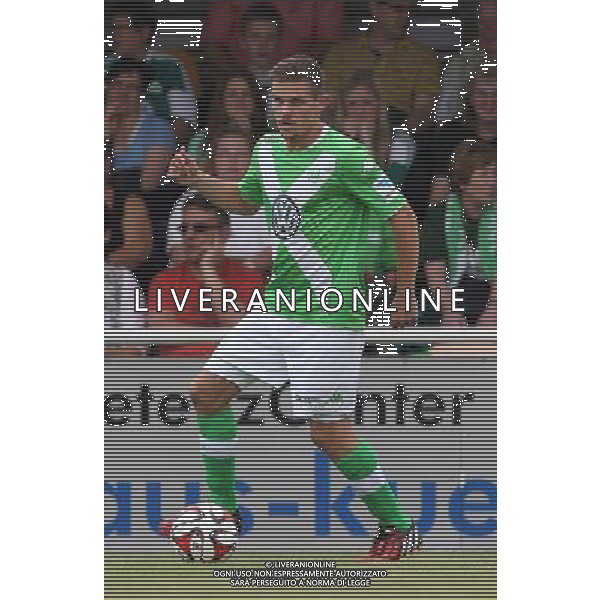 firo : 08.07.2014 Fu§ball,1.Bundesliga, Saison 2014/2015 VfL Wolfsburg, Testspiel, Sebastian JUNG, Einzelaktion $worldrightsEs gelten unsere AGB, einsehbar auf www.firosportphoto.de, copyright by firo sportphoto: Coesfelder Str. 207 D-48249 DŸlmen www.firosportphoto.de mail@firosportphoto.de (V o l k s b a n k B o c h u m - W i t t e n ) BLZ.: 430 601 29 Kt. Nr.: 341 117 100 Tel:Ê +49-2594-9916004 Fax:Ê+49-2594-9916005 AG ALDOL IVERANI SAS ONLY ITALY