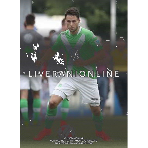 firo : 08.07.2014 Fu§ball,1.Bundesliga, Saison 2014/2015 VfL Wolfsburg, Testspiel, Christian TR€SCH, Einzelaktion $worldrightsEs gelten unsere AGB, einsehbar auf www.firosportphoto.de, copyright by firo sportphoto: Coesfelder Str. 207 D-48249 DŸlmen www.firosportphoto.de mail@firosportphoto.de (V o l k s b a n k B o c h u m - W i t t e n ) BLZ.: 430 601 29 Kt. Nr.: 341 117 100 Tel:Ê +49-2594-9916004 Fax:Ê+49-2594-9916005 AG ALDOL IVERANI SAS ONLY ITALY
