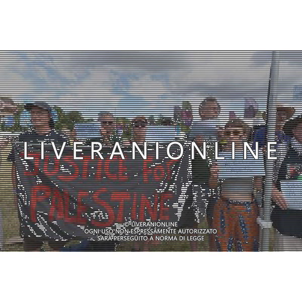 Malmesbury, UK, 27/07/2014 : Gazza Protest at WOMAD - World of Music, Arts and Dance. A small protest was held in the main arena in the Sunday morning where the names of Palestinians killed in the conflict was read out . ©PHOTOSHOT/Agenzia Aldo Liverani sas - ITALY ONLY - EDITORIAL USE ONLY