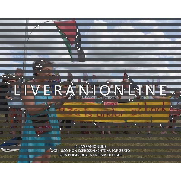 Malmesbury, UK, 27/07/2014 : Gazza Protest at WOMAD - World of Music, Arts and Dance. A small protest was held in the main arena in the Sunday morning where the names of Palestinians killed in the conflict was read out . ©PHOTOSHOT/Agenzia Aldo Liverani sas - ITALY ONLY - EDITORIAL USE ONLY